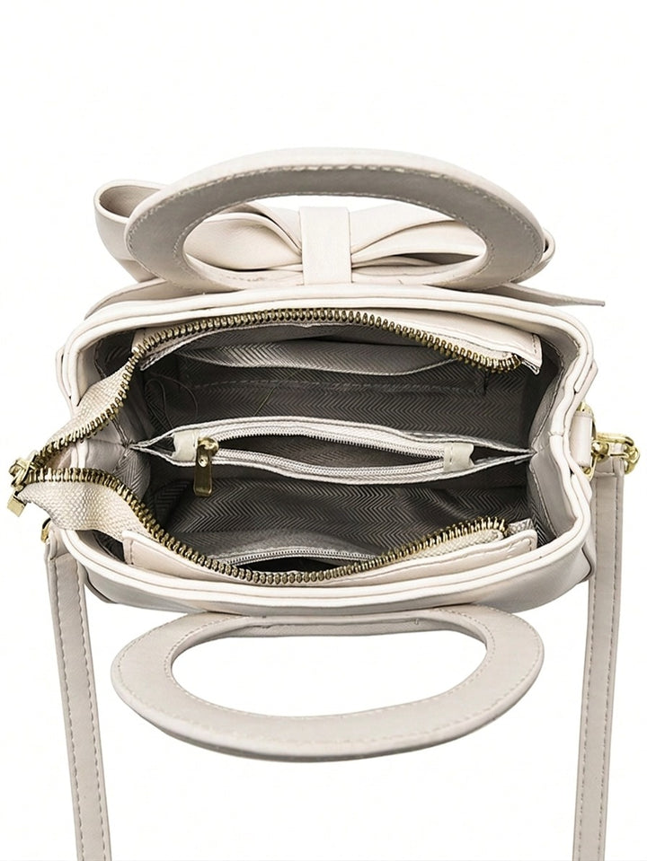 Ivory Bow Handbag