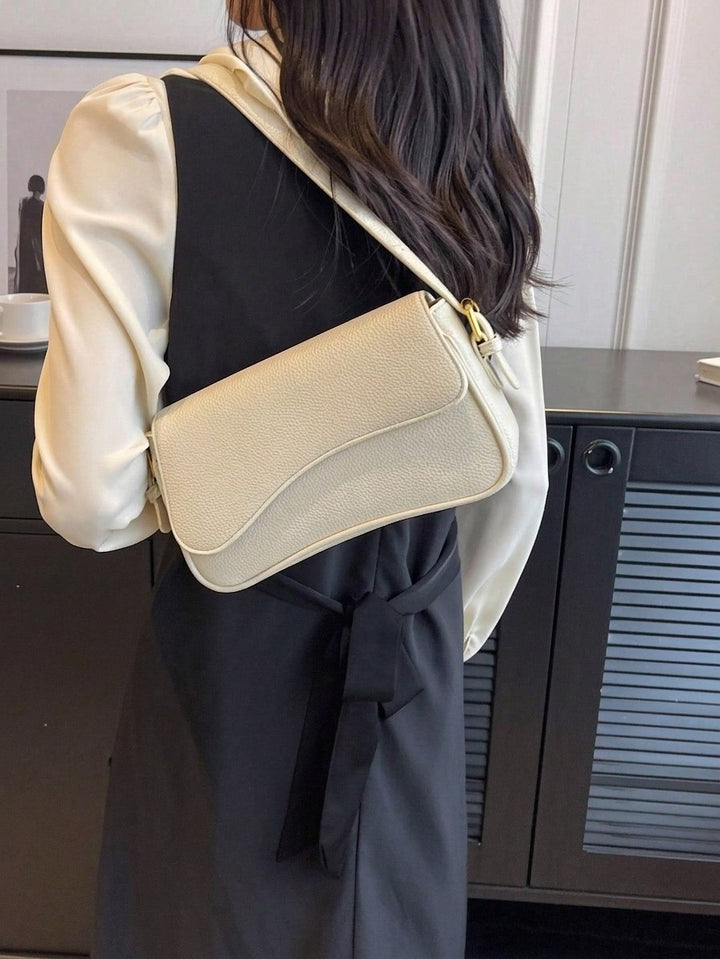 Sleek Black Wave-Flap Shoulder Bag